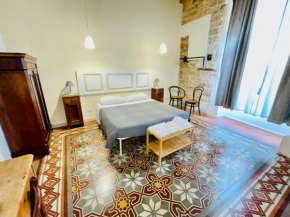 Гостиница Palazzo Lupicini Affittacamere  Бишелье